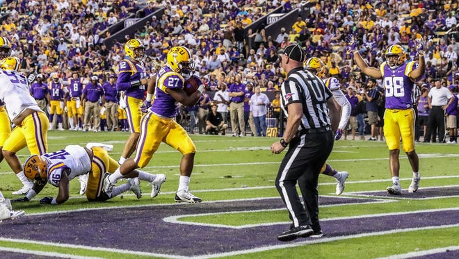 LSU running back Lanard Fournette scores a touchdown during the team's spring game.
