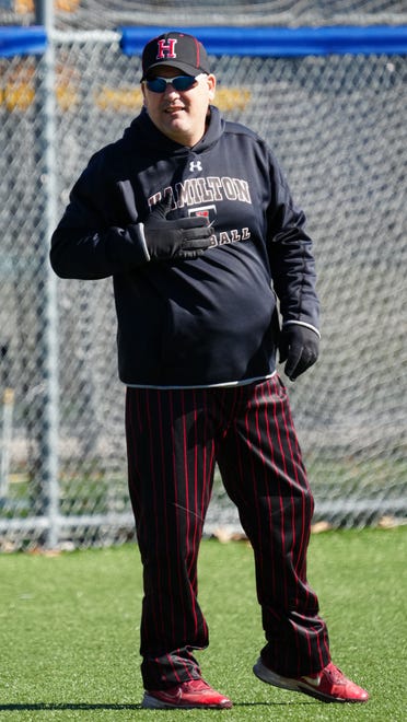 Sussex Hamilton head coach Mike Schramek gives a signal during the game at Brookfield Central on Saturday, April 6, 2024. Sussex Hamilton won 8-2.
