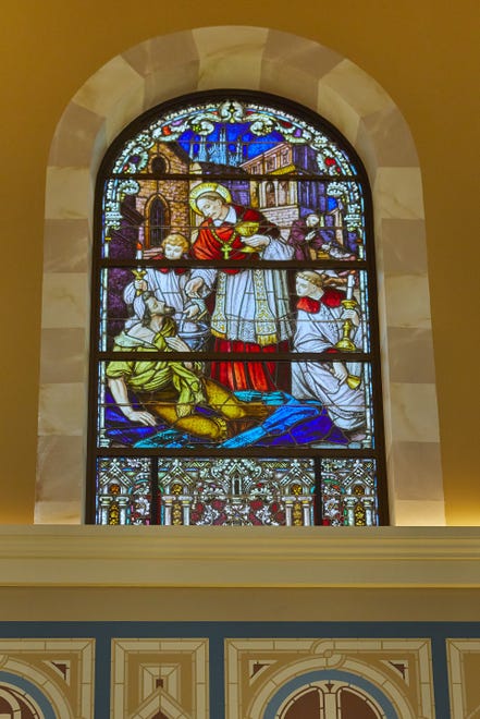 St. Charles Borromeo is depicted in one of the stained-glass windows at St. Charles Parish, a Roman Catholic church in Hartland. This window was obtained from a church which closed in Indiana.
