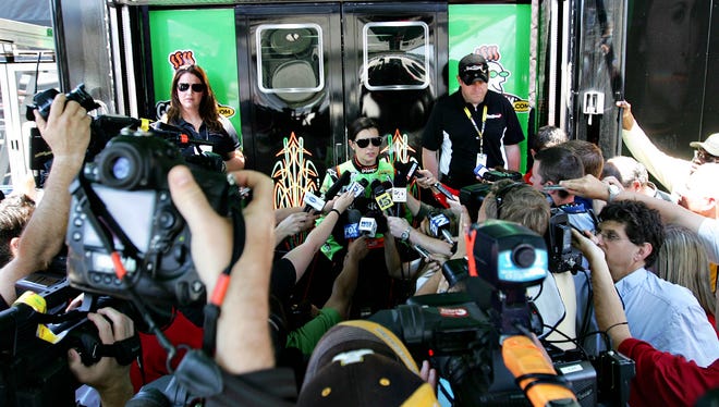NASCAR Sprint Cup driver Danica Patrick (10) talks to the media during practice for the Southern 500 at Darlington Raceway on May 11, 2012.